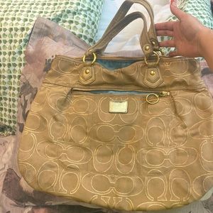 Poppy fabric Coach PurseMuch life left for casual wear.